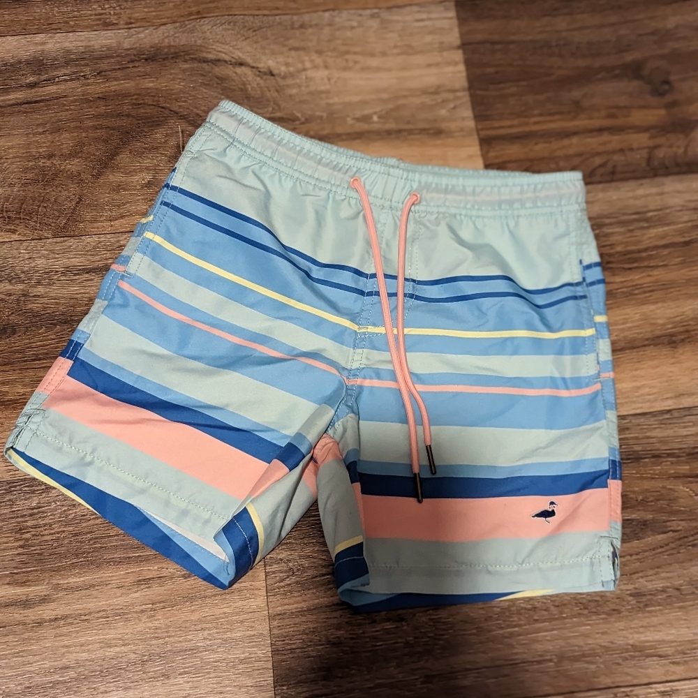 Properly tied swim trunks boys